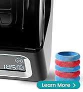 a black coffee maker with a stack of colorful plastic rings.