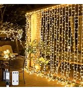 JMEXSUSS 300 LED Remote Control Christmas Curtain Lights, Plug in Fairy Curtain Lights Outdoor, W...