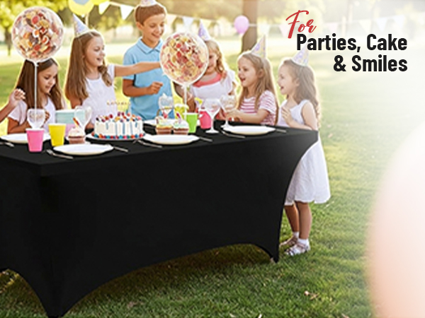 Text reads 'Parties, Cake &amp; Smiles'. Outdoor garden party setup with black tablecloth table, people gathered for celebration event with decorations and food.