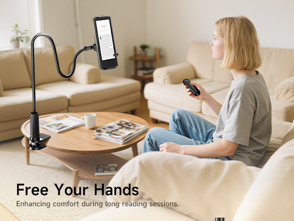 Text reads 'Free Your Hands' and 'Enhancing comfort during long feeding sessions'. Series showing phone holder mounted above bed for hands-free device use.