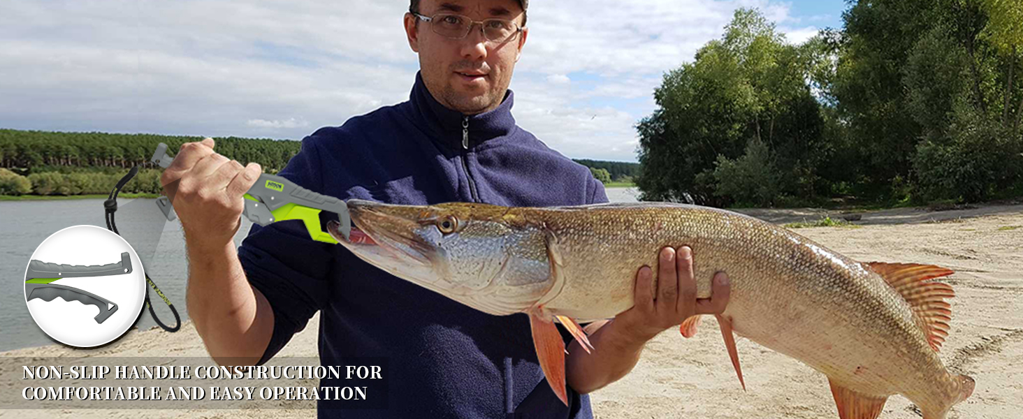 Person holding large freshly caught fish on riverbank. Wearing dark jacket and cap. Text mentions flexible rod grip for comfort and safety.