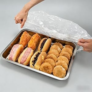 Drape cover over the sheet pan.