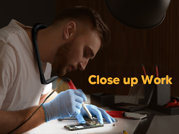 An electrician or mechanic is repairing and using the EastPin necklight for handsfree illumination