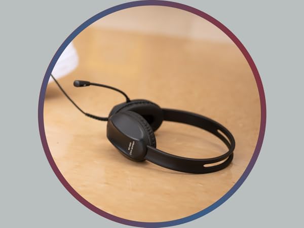 A Cyber Acoustics headset being drug on the floor 