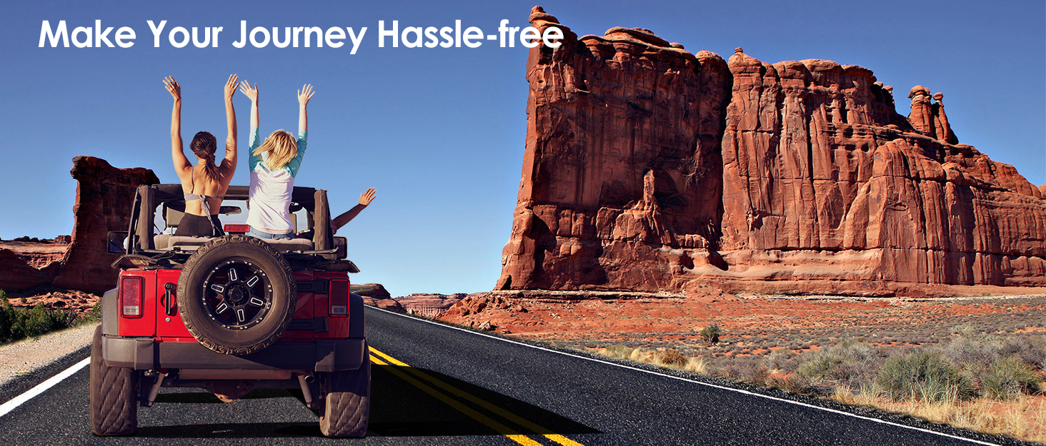Red off-road vehicle on desert highway with towering red rock formation in background. Text overlay reads 'Make Your Journey Hassle-free'.