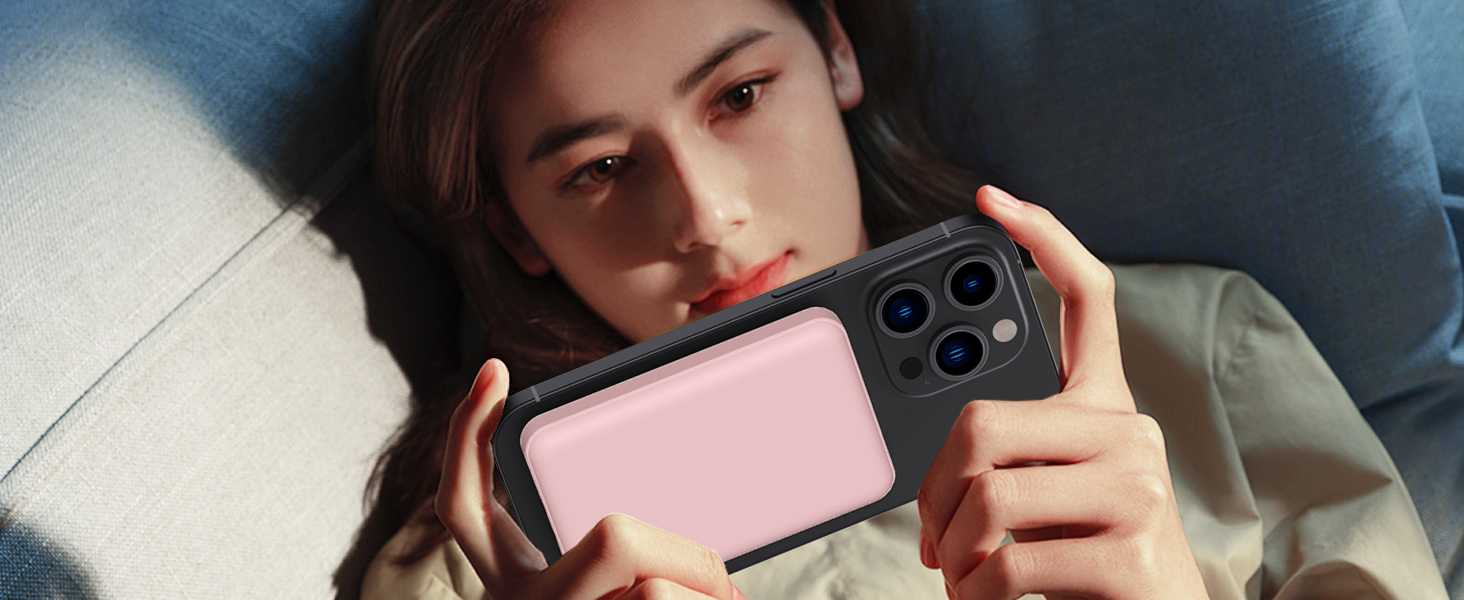 Pink smartphone case with multiple camera cutouts, being held horizontally.