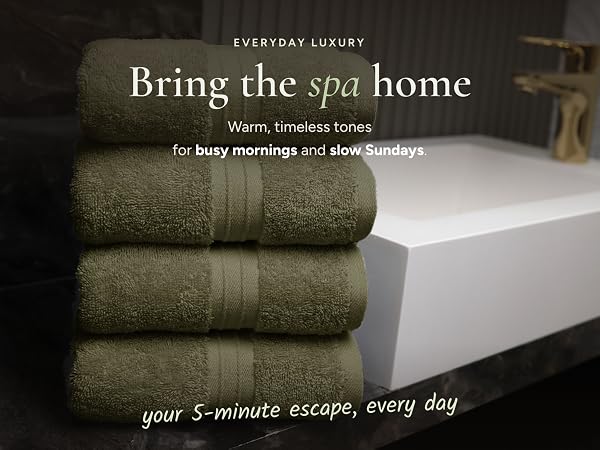 Green Turkish cotton towels in spa bathroom, luxury hotel towel set for home