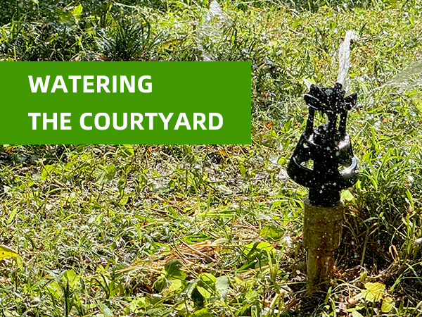 a wobbling sprinkler head watering in the garden