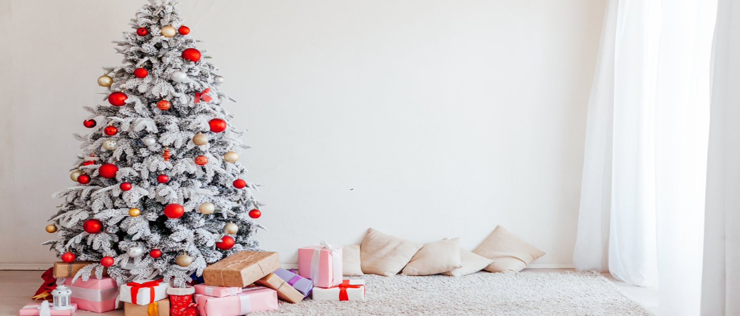 christmas tree with gifts on the floor