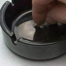 finger to extinguish it