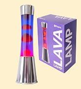Text reads 'LAVA LAVA' on purple box. Lava lamp with red and purple liquid-filled chamber, metallic silver base, and colorful light effects against cream background.