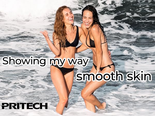 Two women in black swimwear standing in ocean waves. Text overlay reads 'Showing my way smooth skin'. Pritech logo visible.