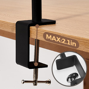 Black desk clamp mount with 'MAX-2.1in' text visible, showing close-up of adjustment mechanism and mounting surface.