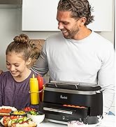father and daughter enjoying hot dog and bun with the Kusini Hot Dog and food steamer
