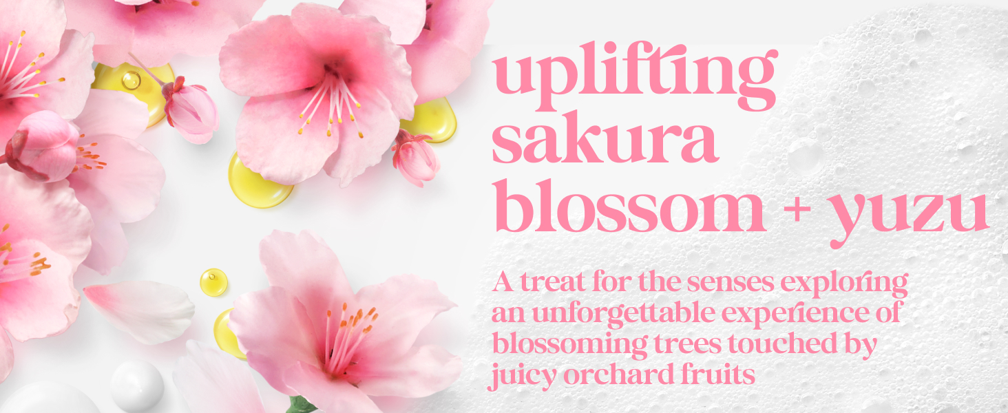 Soft pink sakura blossoms &amp;amp; golden yuzu droplets rest on a textured white background with airy foam.