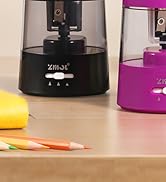 Multiple views of a black circular device positioned on a wooden desk surface, showing different angles and configurations.