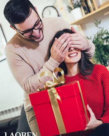 man giving a gift to his girlfriend