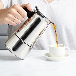 stainless steel espresso maker pouring