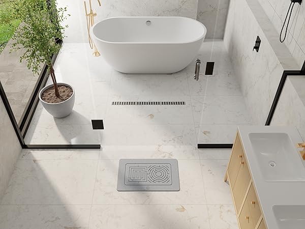 Using the absorbent stone mat as a protective, stylish tray for indoor plants and bathroom