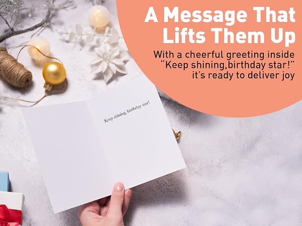 open birthday card showing pre-written message