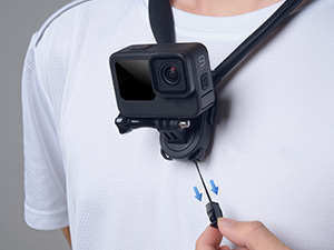 Attach the chest strap to the neck-mount bracket’s ear holes and adjust the strap for a snug fit.