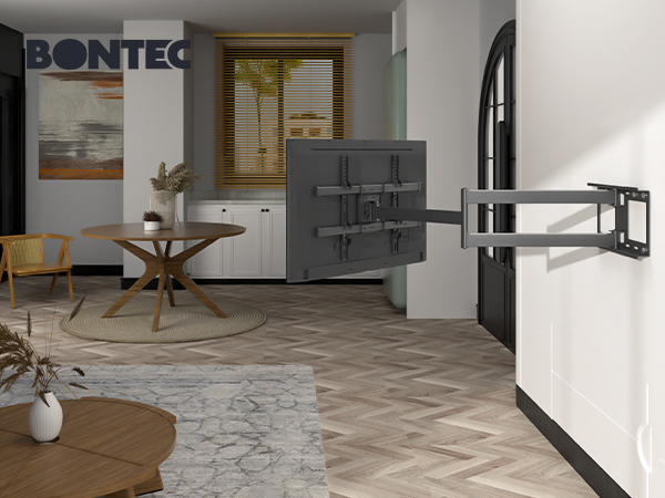 a tv mounted to a wall in a living room.