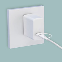 This image shows a wall charger with connected USB-C cable through USB-A adapter