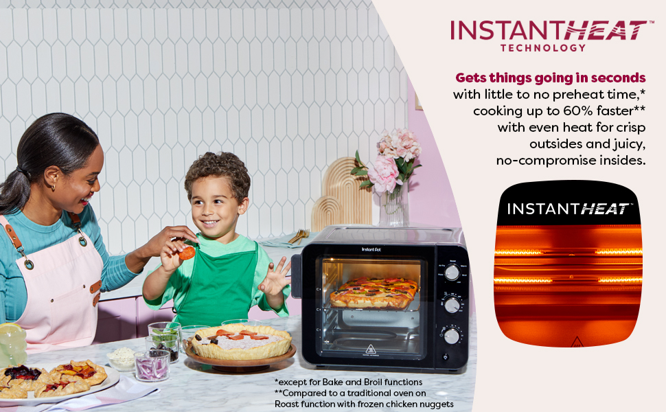 Mom and son cooking pizza in the instant heat toaster oven, copy focuses on instant heat technoloy