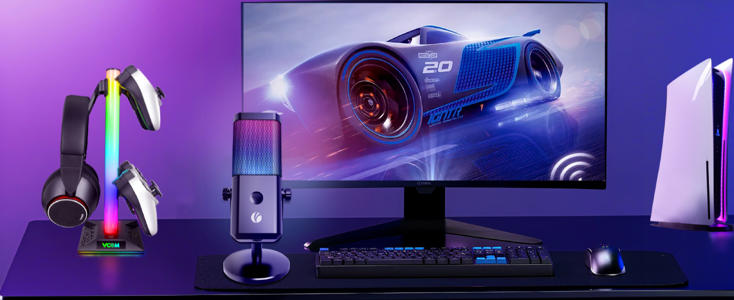 Gaming setup with purple and blue LED lighting showing multiple monitors, gaming peripherals, and RGB-lit components in a darkened room setting.