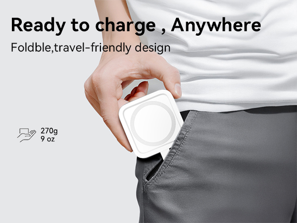Text reads 'Ready to charge, Anywhere' and 'Foldable, travel-friendly design' with '270g 9 oz' specification. Hand holding white circular foldable charging device against gray fabric background.