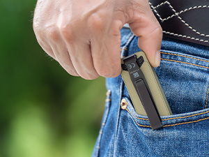 Slim flashlight for pants pocket carry at work