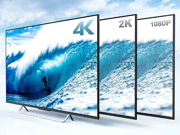 the big screen tv is on a stand.