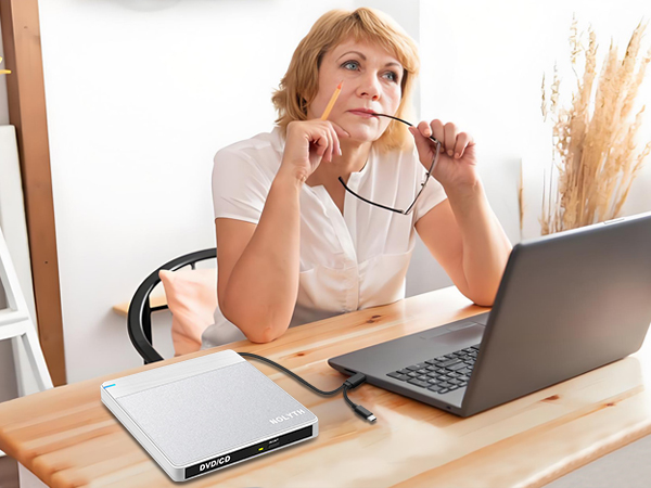 This external disk drive for pc is easy to use on your travels to play DVDs and burn videos.