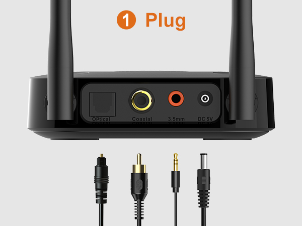 Black wireless router with two antennas and multiple audio ports. Four different cable connectors shown below for plugging into the device.