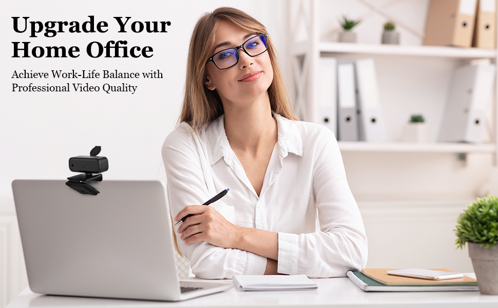 woman working at a desk with a laptop
