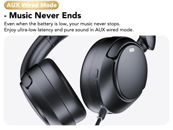 Text reads 'AUX Wired Mode - Music Never Ends' and 'Even when the battery is low, your music never stops. Enjoy ultra-low latency and pure sound in AUX wired mode.' Multiple angles of black wireless headphones.