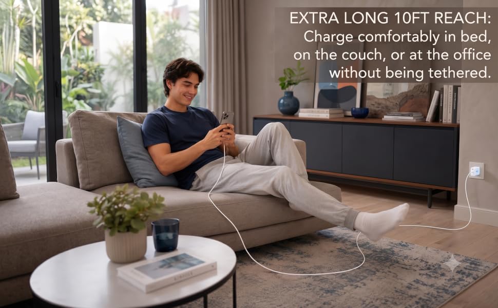 Man relaxing on couch using extra long 10ft cable plugged into TT&amp;amp;C 40W 2-port wall charger