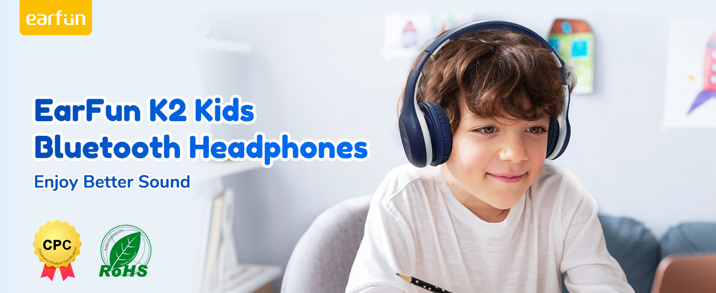 Navy blue over-ear wireless headphones worn by a child. Product name 'EarFun K2 Kids Bluetooth Headphones' visible. CPC and RoHS certification logos shown.