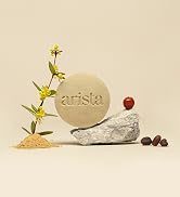 Arista’s natural ingredients oily hair shampoo bar balanced on natural stone