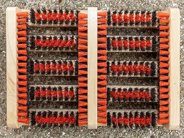close up of shoe scrubber on concrete
