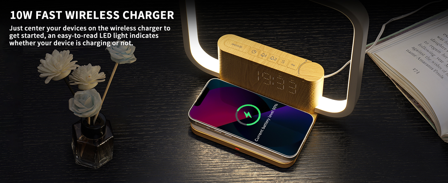 Wireless charger with LED light bar. Golden rectangle device charging a smartphone, displaying colorful charging indicator on phone screen.