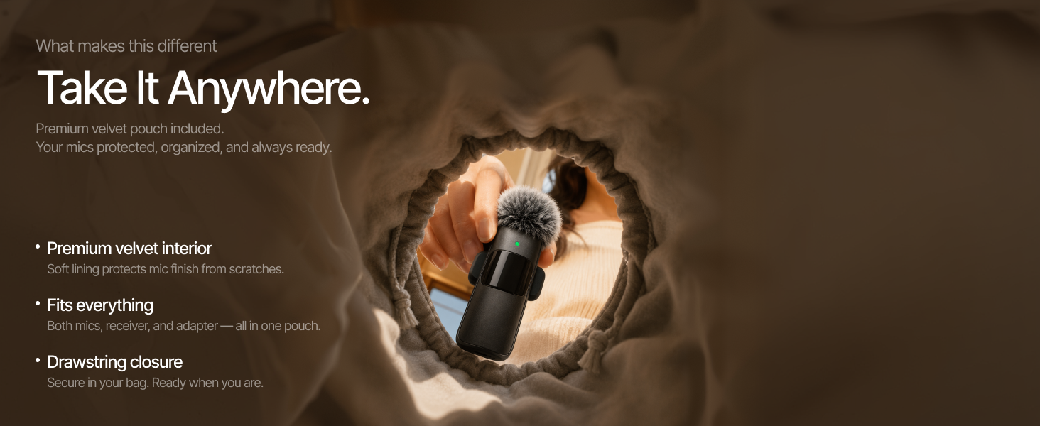 hands placing two mini mic pro wireless transmitters into an open gray velvet drawstring travel pouc