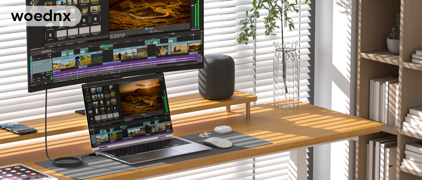 a laptop on a desk with a monitor and mouse