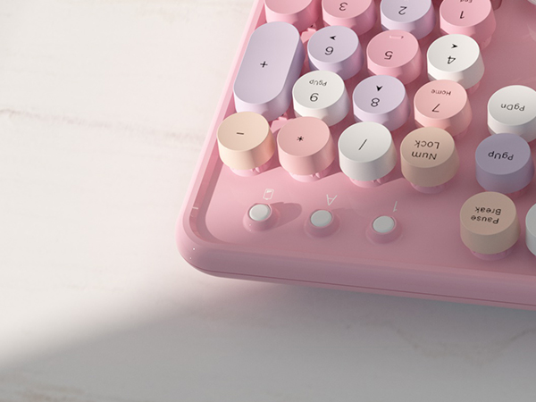 pink colorful wireless keyboard and mouse