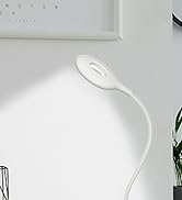 White, flexible desk lamp with a slim, curved neck and circular base. The lamp head features a round, flat light source, designed for adjustable positioning on a desk or table.