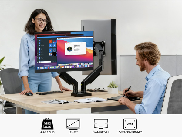 Modern office setting with multiple people working at ergonomic desk setups, featuring adjustable monitor stands and computer workstations.