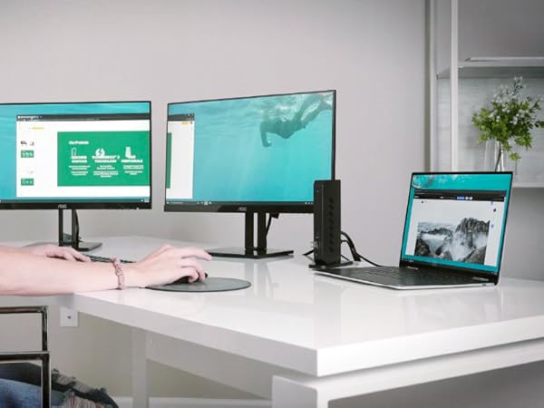 A docking station 3 monitors boosts multitasking, perfect for finance, design, or streaming setups