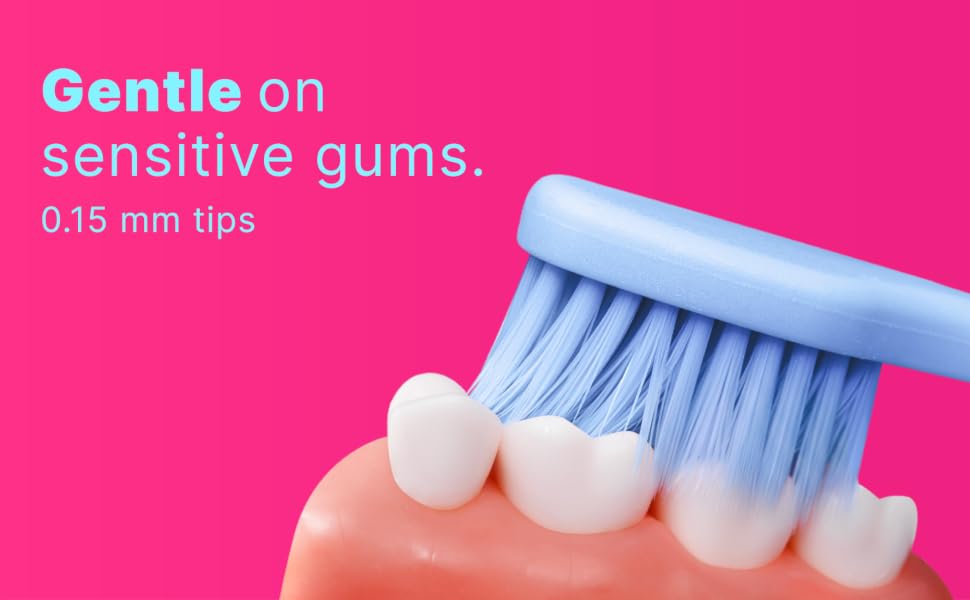Soft toothbrush with 0.15 mm tapered bristle tips designed for sensitive gums and gentle brushing.