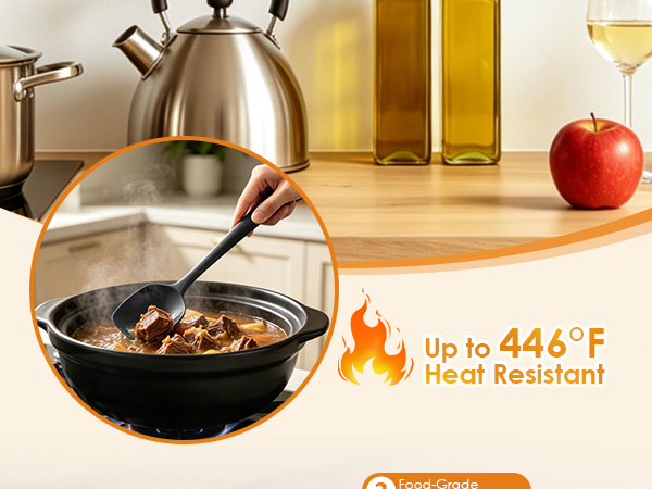 Silicone kitchen spatula stirring stew in a pot, heat resistant up to 446°F