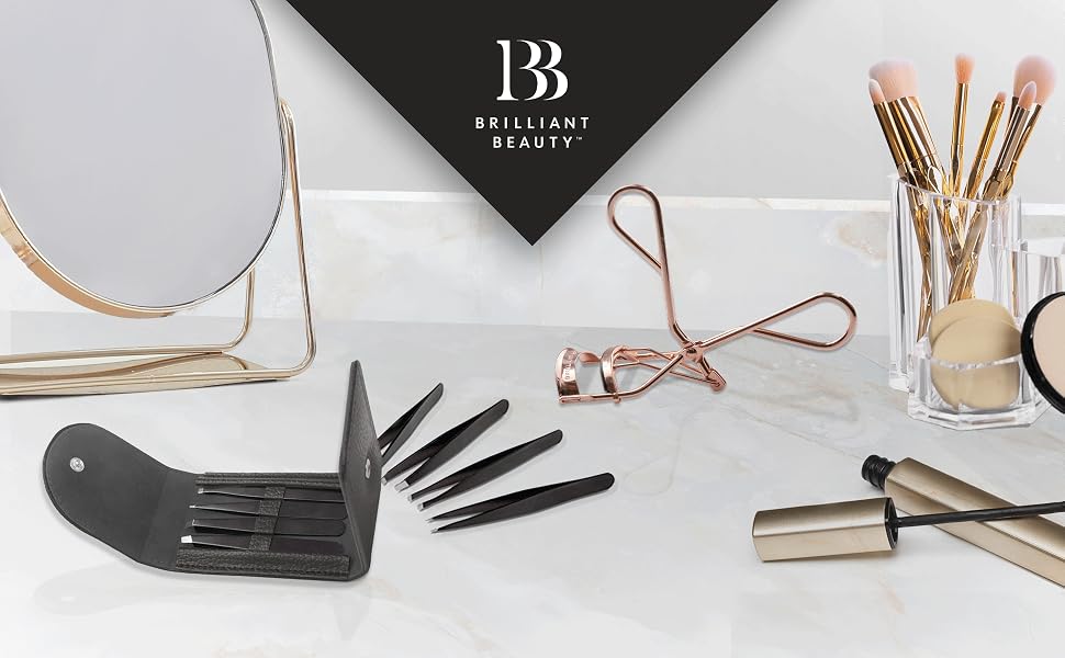 Brilliant Beauty Products including eyelash curler, tweezer set, and hair straightener. 